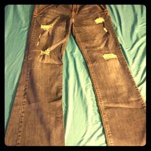 Jeans-bottoms are distressed, bought like that